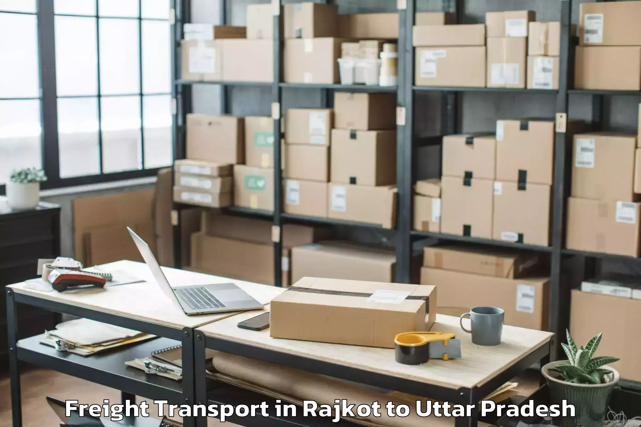 Reliable Rajkot to Manjhanpur Freight Transport